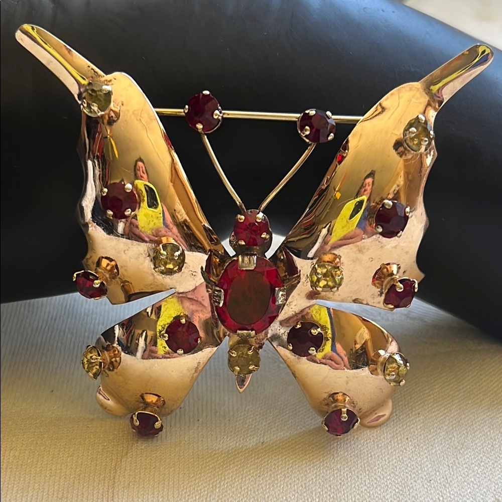 Vintage Elegant Gold on Sterling Butterfly Brooch with Red and yellow Accents.